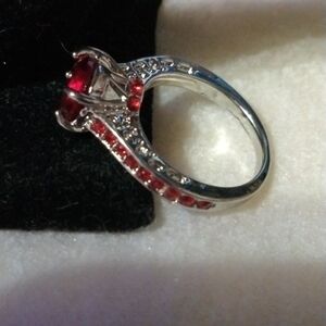 Red colored ring silver tone size 6 NWT (sku 591)